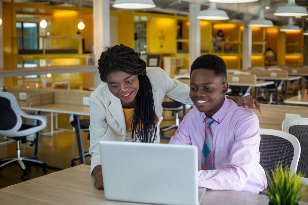 portrait of african american business people at workplace in office